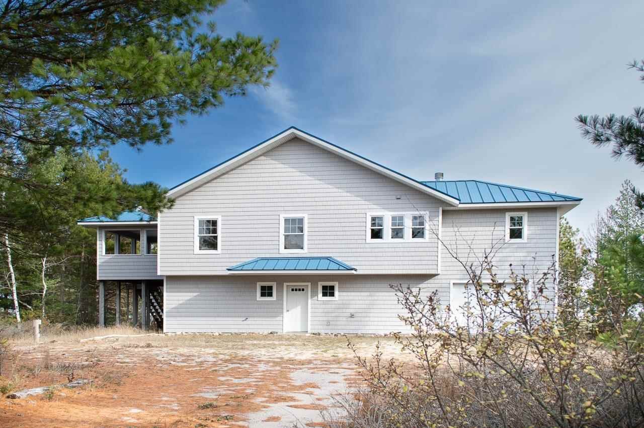 25. Single Family Homes for Sale at 32012 East Side Drive Beaver Island, Michigan 49782 United States
