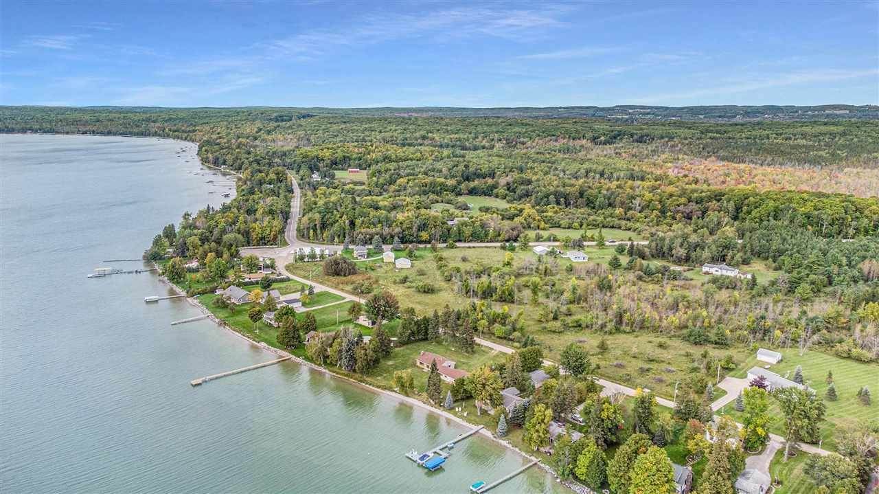 7. Single Family Homes for Sale at 3835 Greenmans Point Road Cheboygan, Michigan 49721 United States