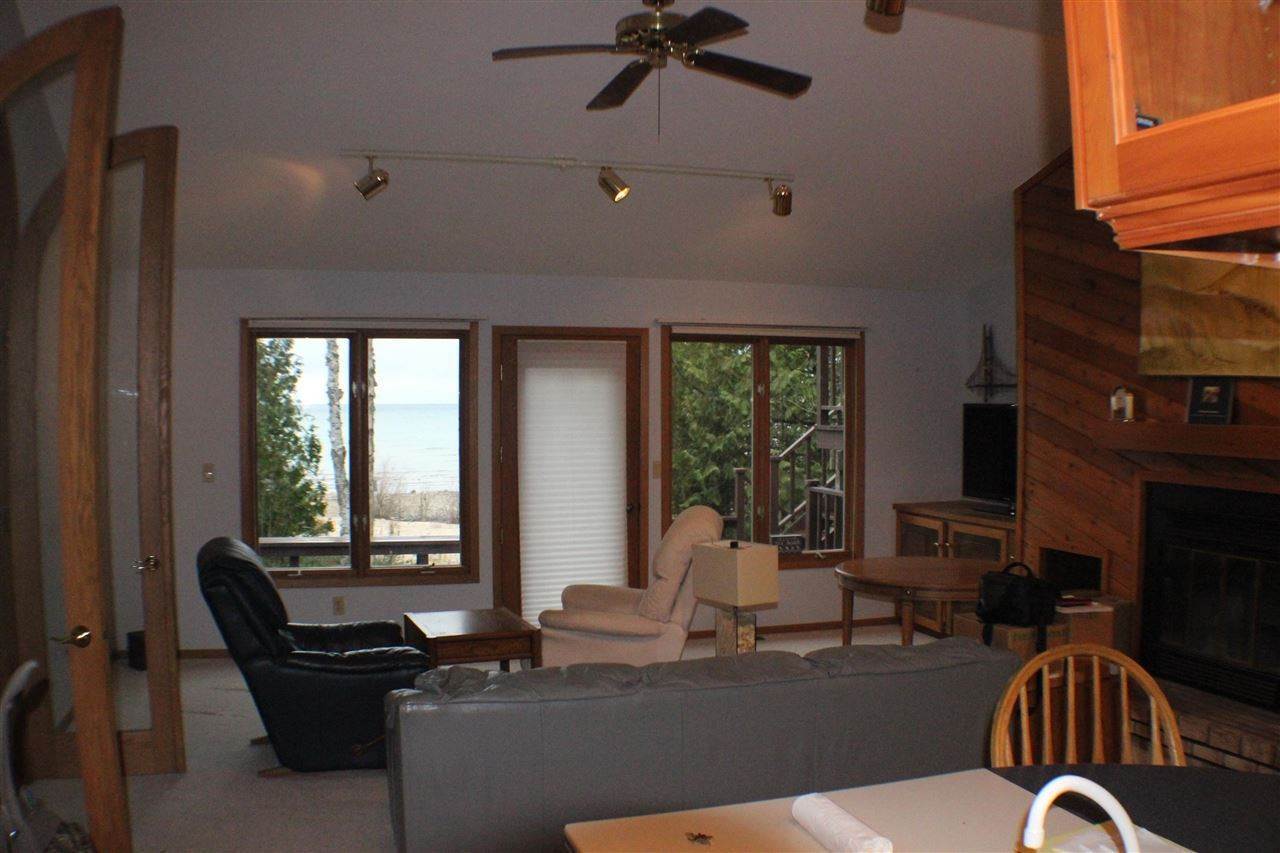 15. Single Family Homes for Sale at 4467 Lake Shore Drive Charlevoix, Michigan 49720 United States