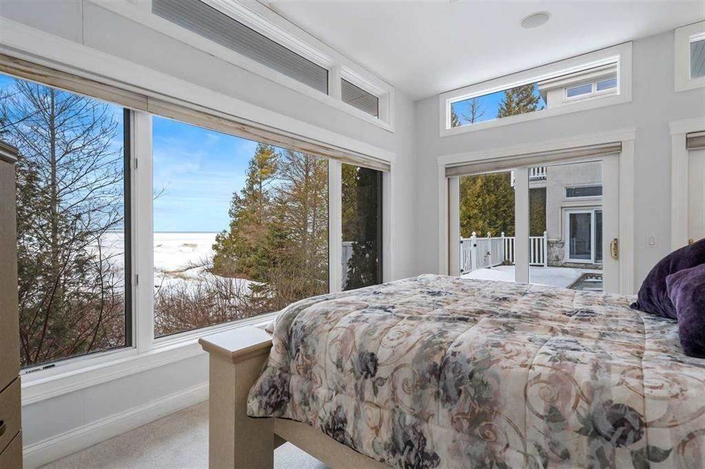 16. Single Family Homes for Sale at 6369 E Wilderness Park Drive Mackinaw City, Michigan 49701 United States