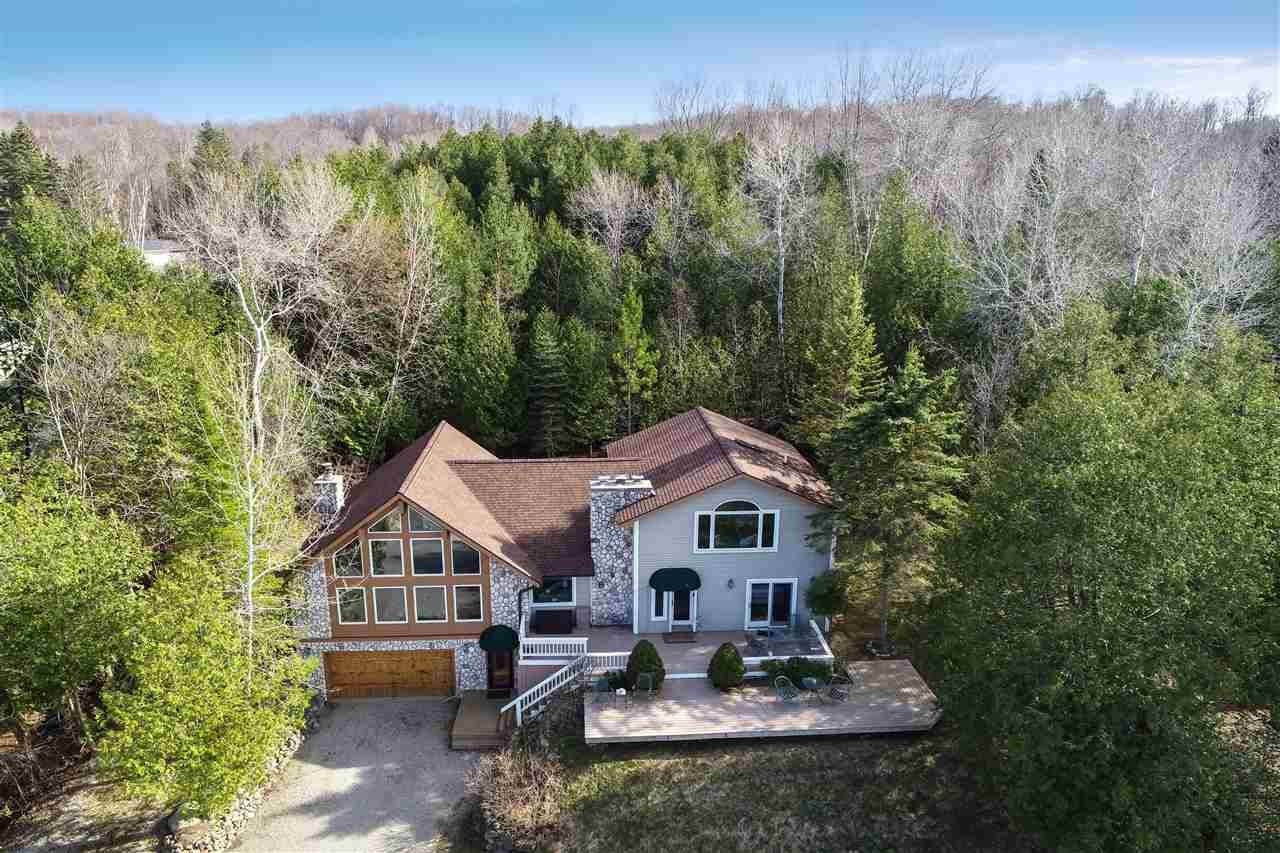 32. Single Family Homes for Sale at 4098 Lakeshore Road Boyne City, Michigan 49712 United States
