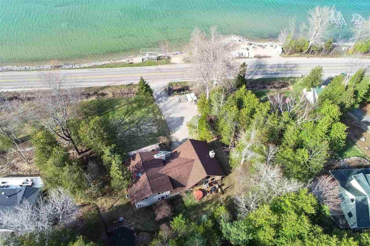 34. Single Family Homes for Sale at 4098 Lakeshore Road Boyne City, Michigan 49712 United States