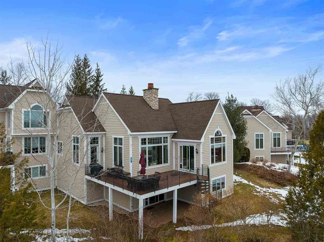 25. Single Family Homes for Sale at 1200 Aspen Way Bay Harbor, Michigan 49770 United States