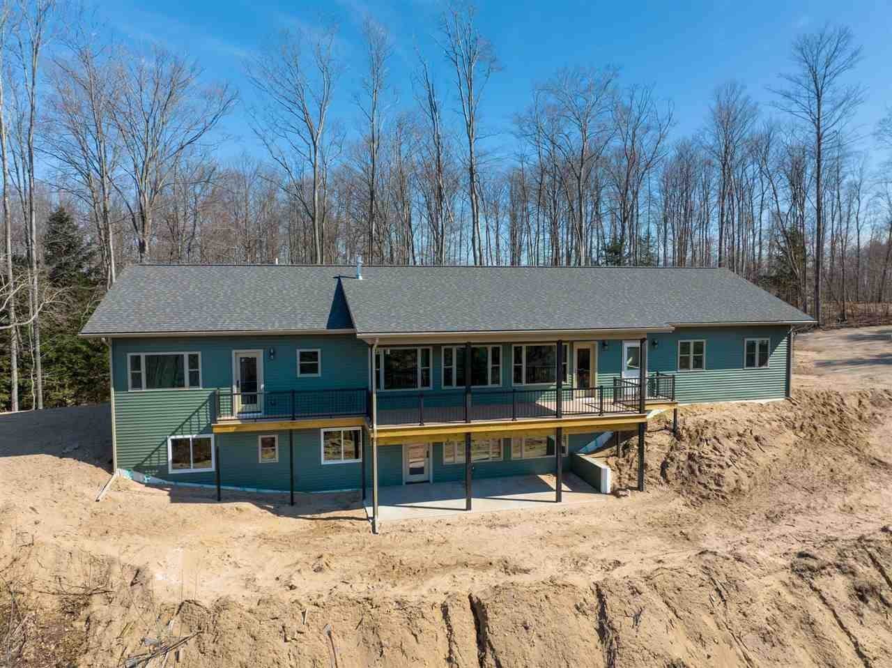31. Single Family Homes for Sale at 690 High Pines Trail Boyne City, Michigan 49712 United States