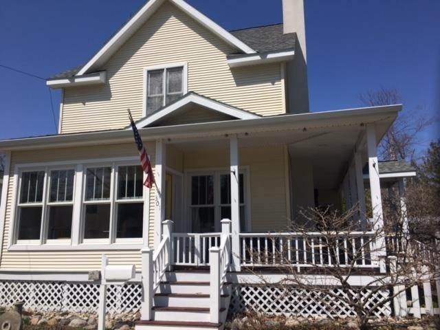 Single Family Homes for Sale at 301 Mason Street Charlevoix, Michigan 49720 United States