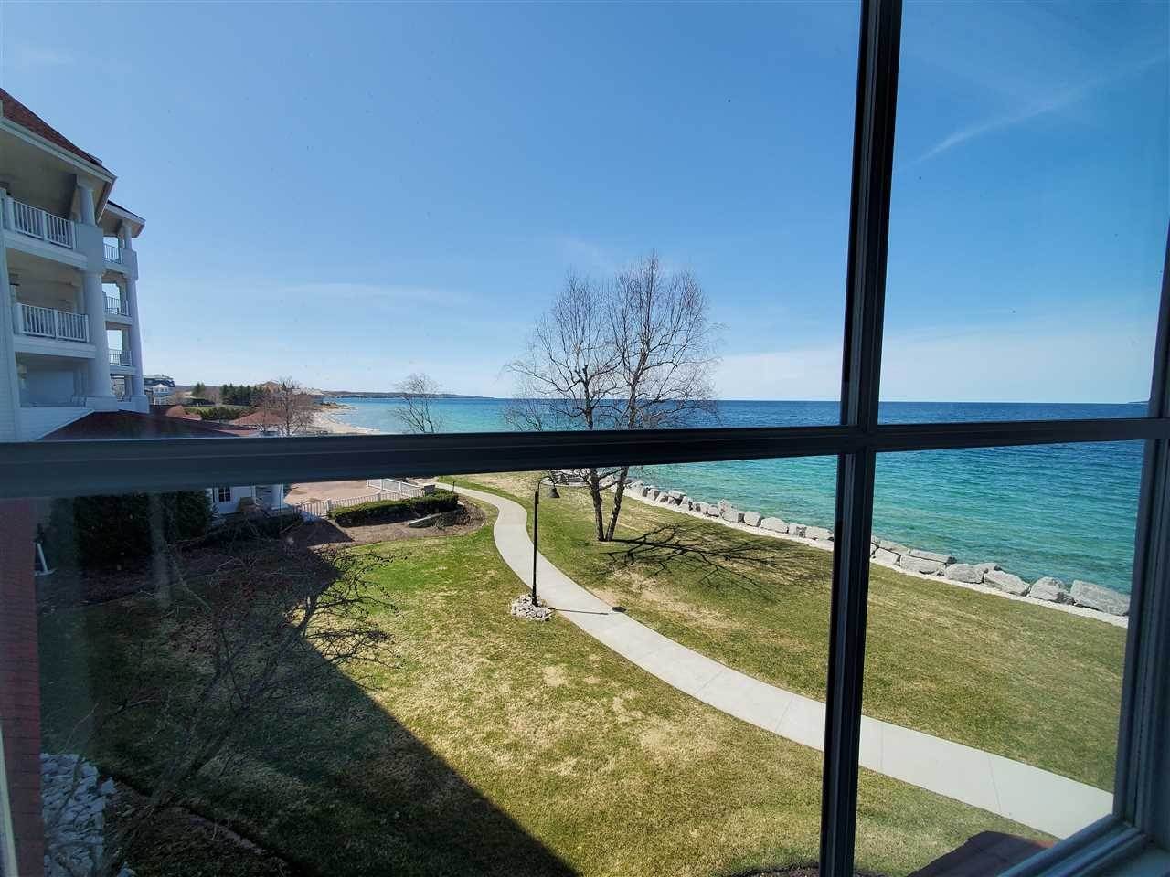 22. Single Family Homes for Sale at 3600 Village Harbor Drive Bay Harbor, Michigan 49770 United States