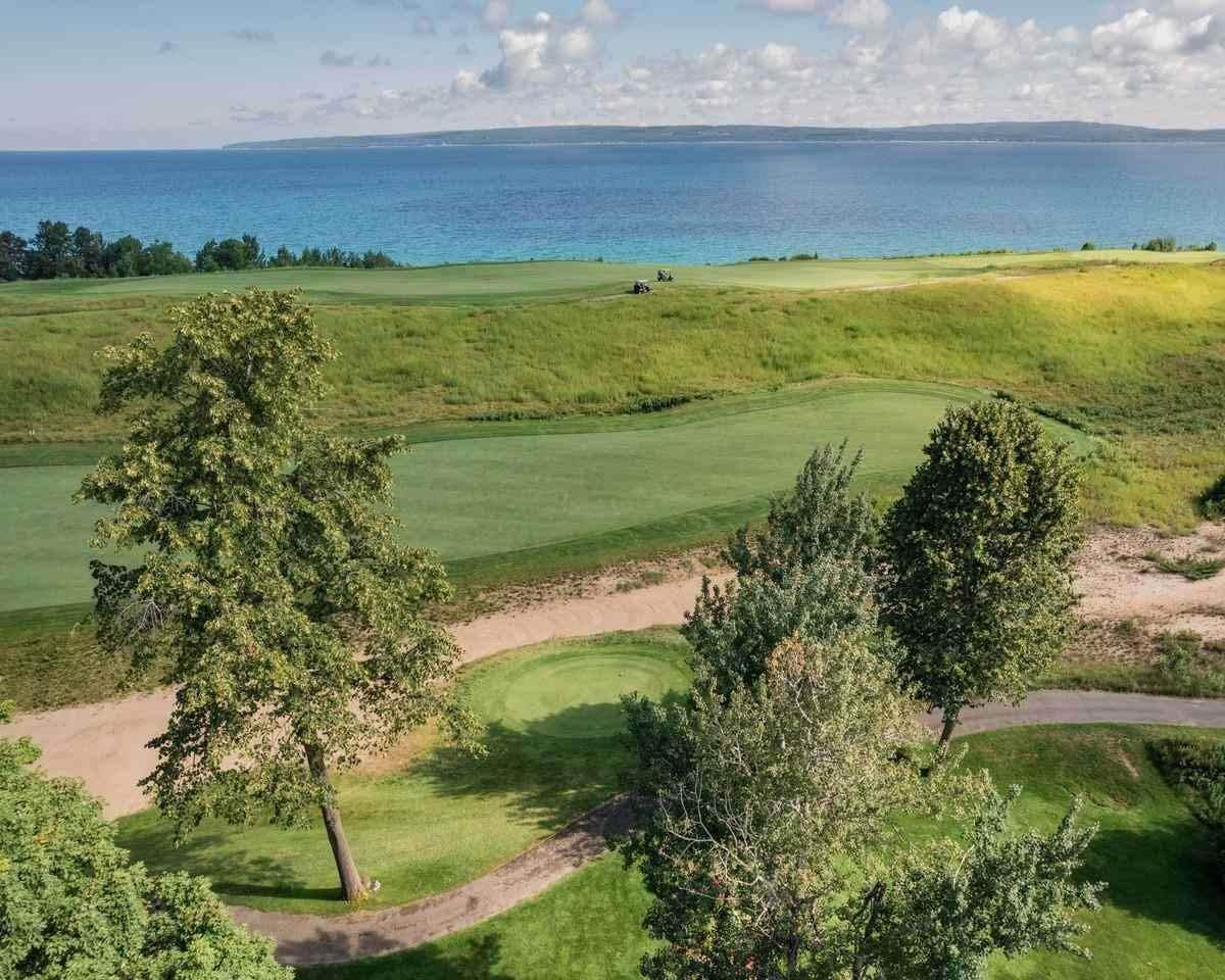6. Single Family Homes for Sale at 4984 Wildwinds Drive Bay Harbor, Michigan 49770 United States