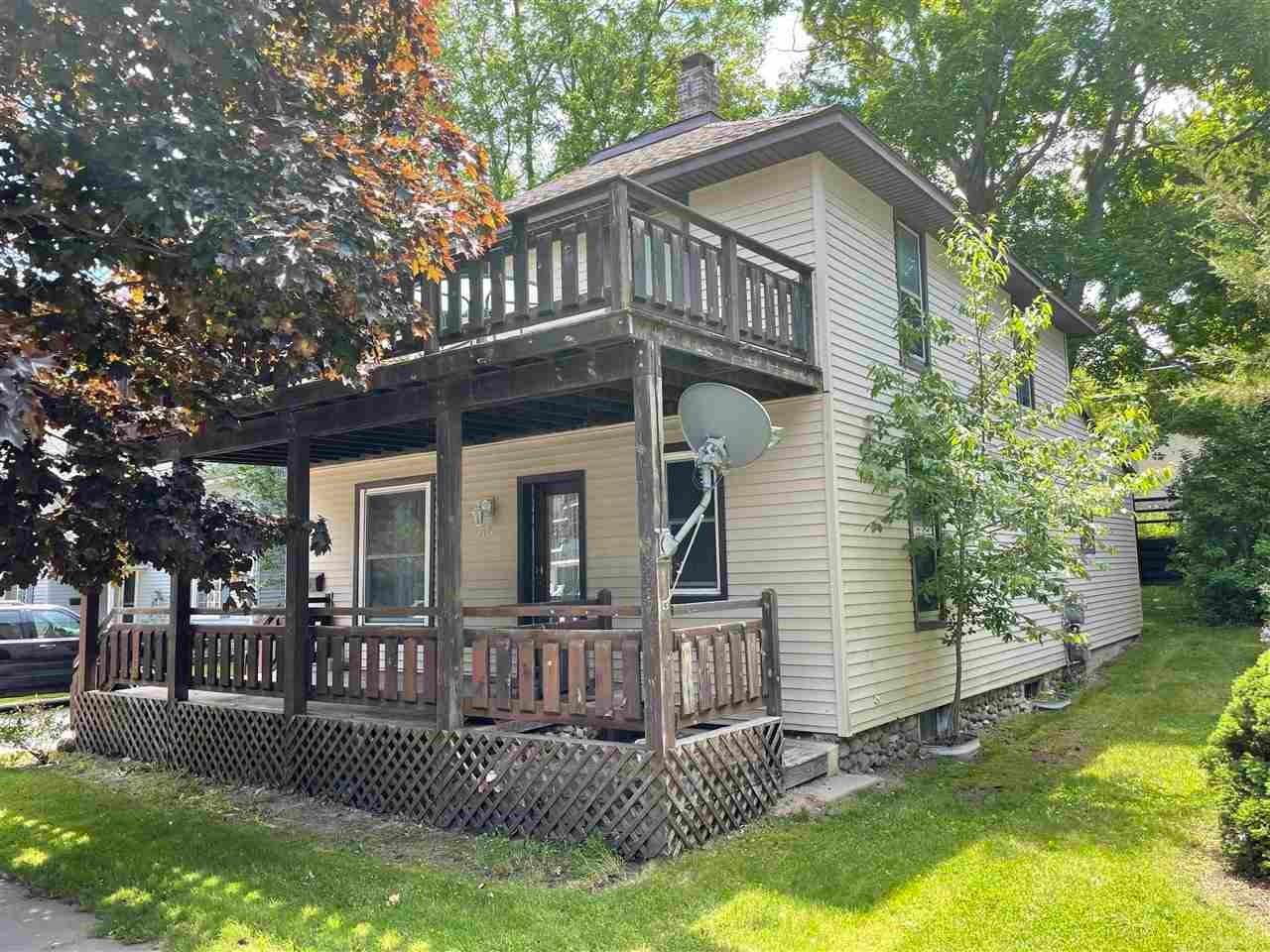 6. Single Family Homes for Sale at 316 Antrim Street Charlevoix, Michigan 49720 United States