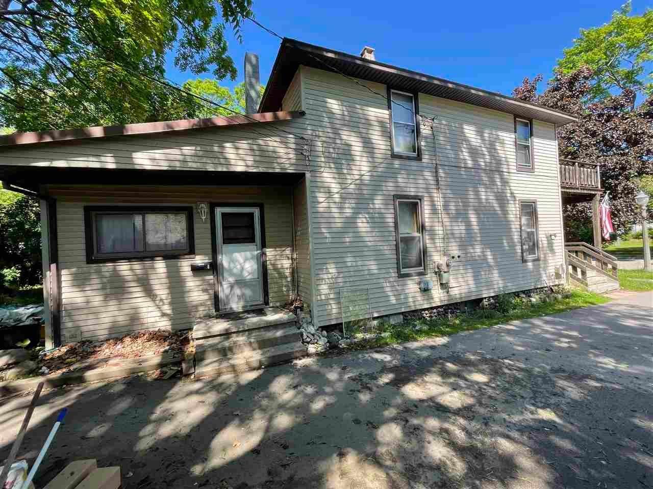 9. Single Family Homes for Sale at 316 Antrim Street Charlevoix, Michigan 49720 United States