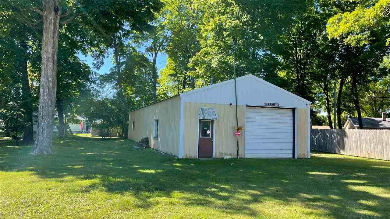22. Single Family Homes for Sale at 636 Petoskey Avenue Charlevoix, Michigan 49720 United States