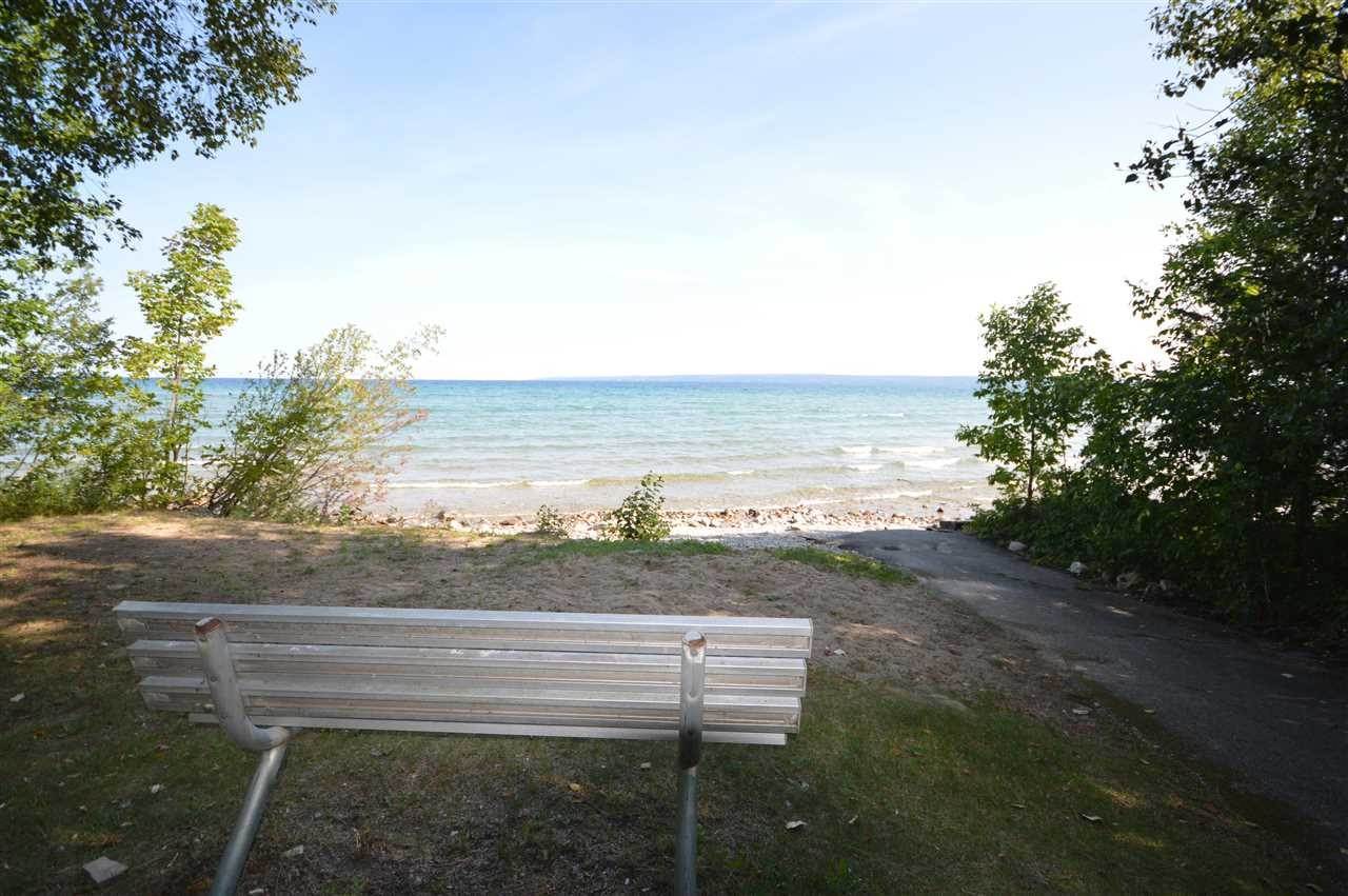 38. Single Family Homes for Sale at 7050 Nine Mile Point Drive Charlevoix, Michigan 49720 United States