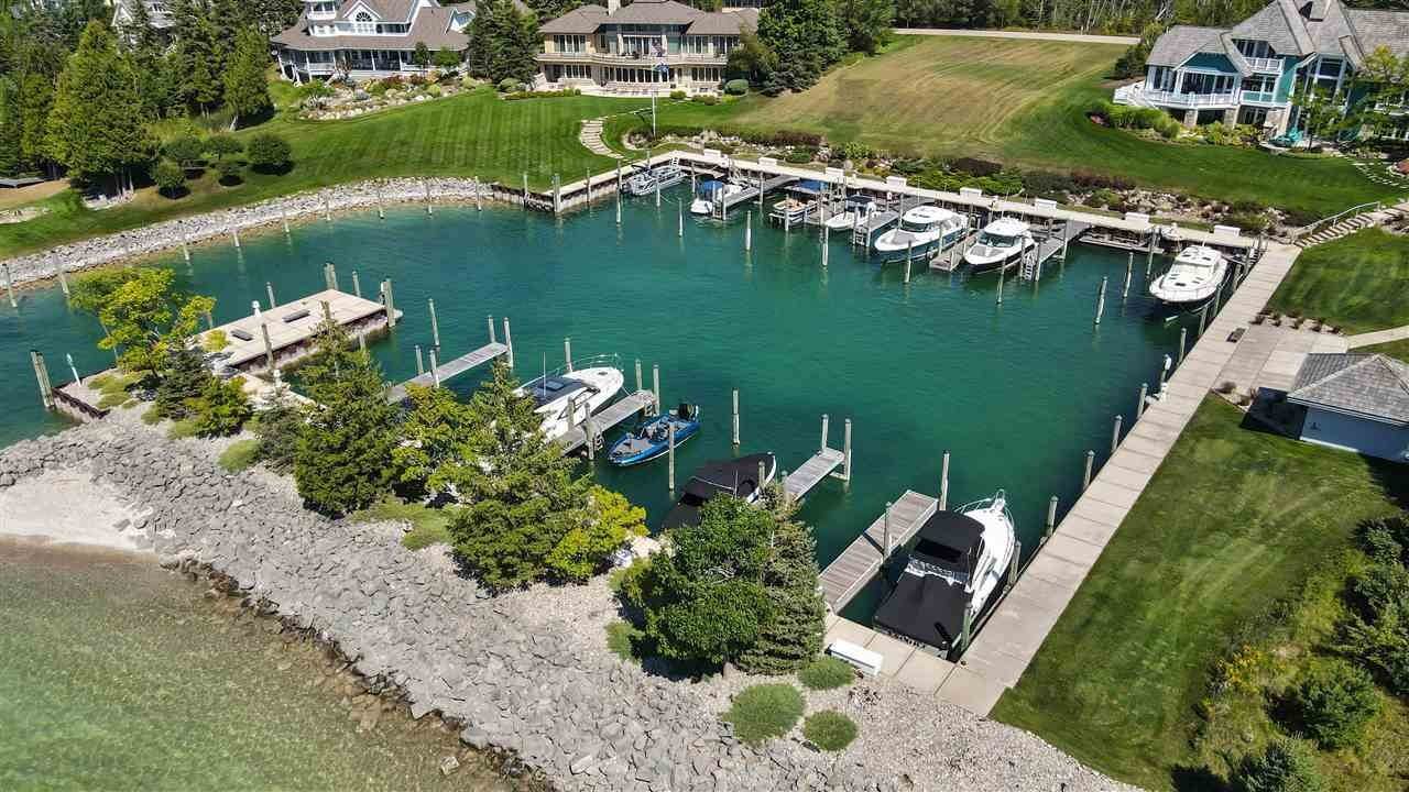 12. Single Family Homes for Sale at 7655 Oyster Bay Drive Charlevoix, Michigan 49720 United States