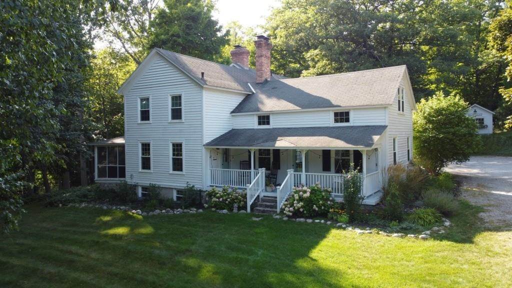 Single Family Homes for Sale at 3257 N Manitou Trail Leland, Michigan 49654 United States
