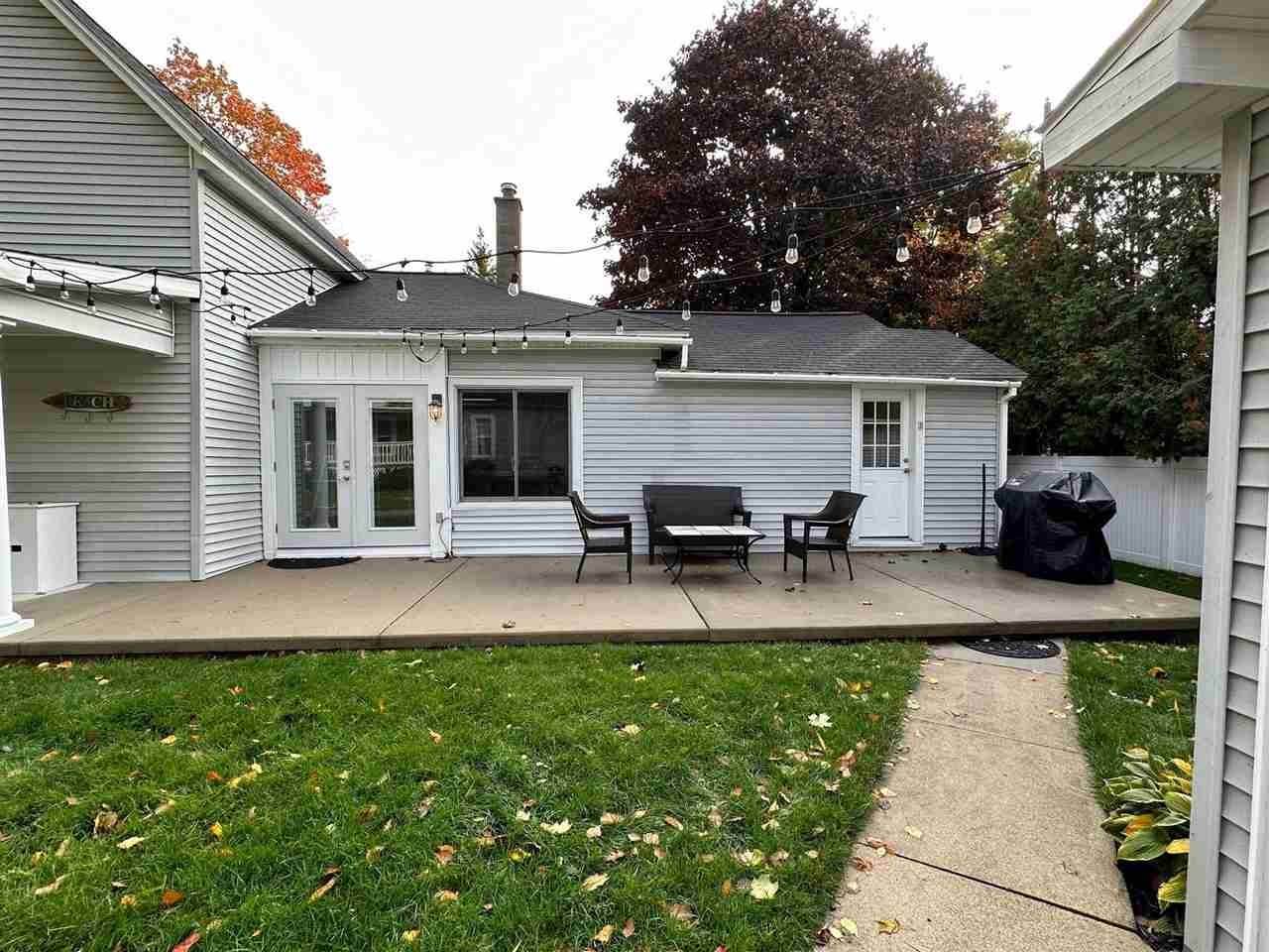 4. Single Family Homes for Sale at 306 Mason Street Charlevoix, Michigan 49720 United States