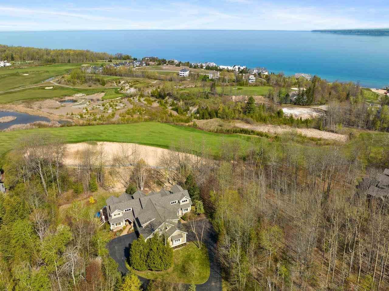 44. Single Family Homes for Sale at 6182 Quarry Ridge Drive Bay Harbor, Michigan 49770 United States