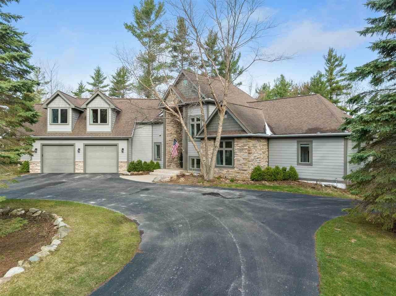 49. Single Family Homes for Sale at 12405 Country Club Court Charlevoix, Michigan 49720 United States