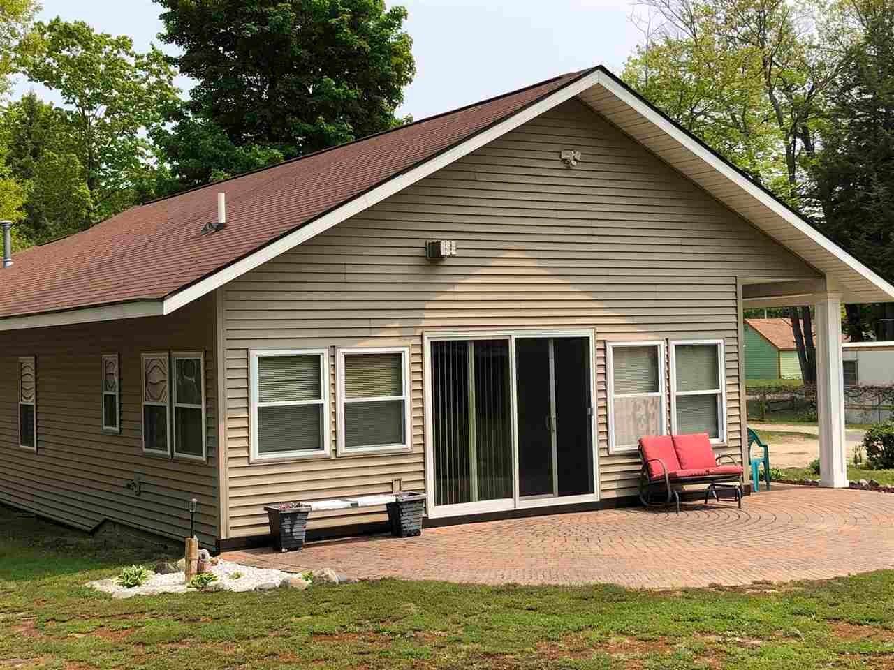 38. Single Family Homes for Sale at 10347 Wheeling Road Carp Lake, Michigan 49718 United States