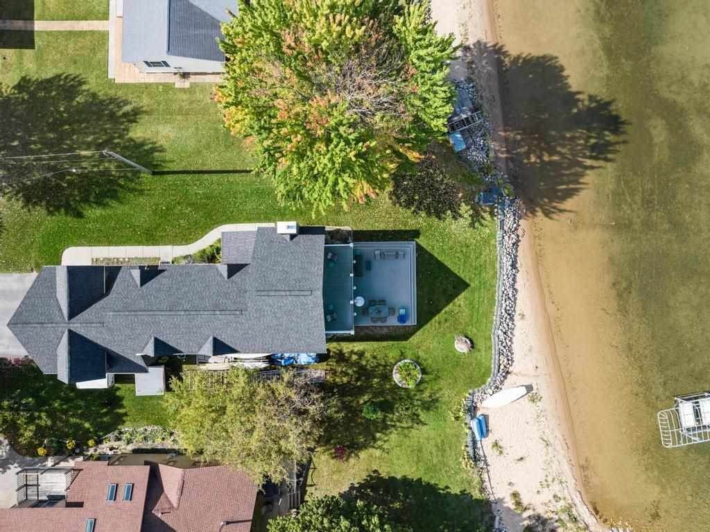 12. Single Family Homes for Sale at 410 Dickens Drive East Jordan, Michigan 49727 United States