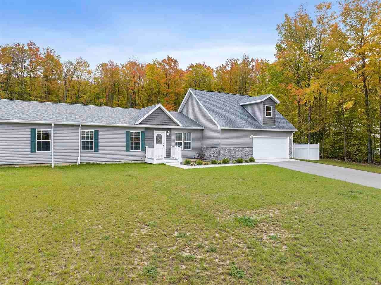 24. Single Family Homes for Sale at 930 Windsong Place Petoskey, Michigan 49770 United States