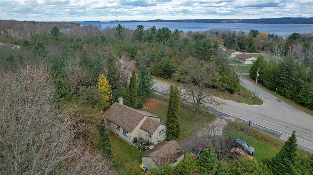 22. Single Family Homes for Sale at 3695 M66 Highway Charlevoix, Michigan 49720 United States