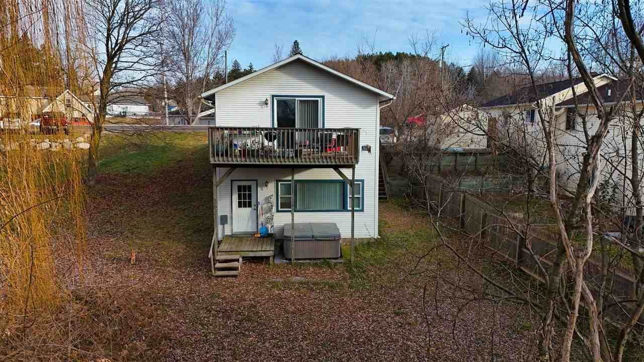 24. Single Family Homes for Sale at 510 State Street East Jordan, Michigan 49727 United States