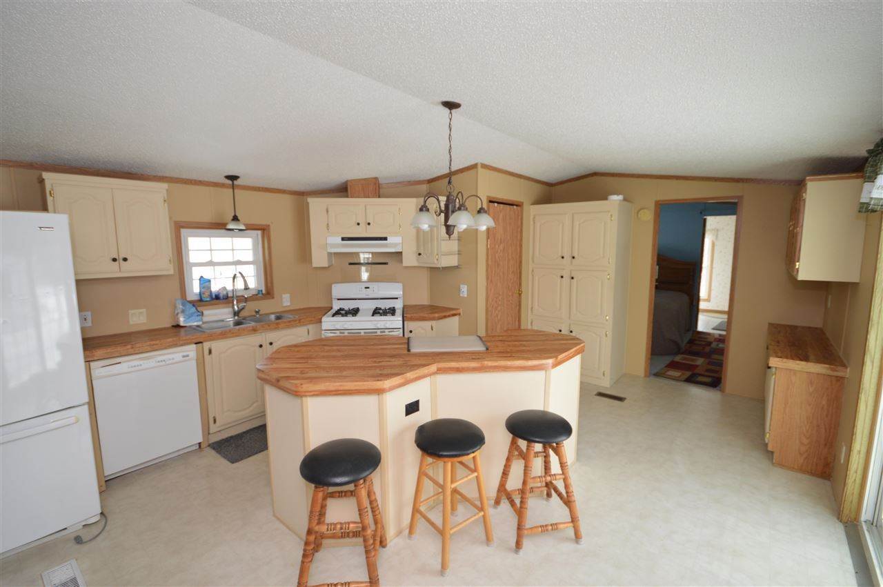 4. Single Family Homes for Sale at 66 Tamarack Drive East Jordan, Michigan 49727 United States