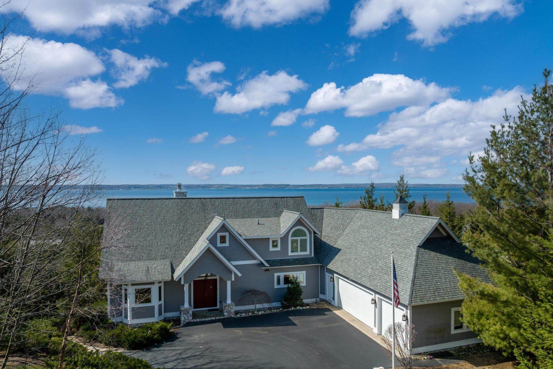 38. Single Family Homes for Sale at Lake Michigan Waterview Home 5285 Windsong Harbor Springs, Michigan 49740 United States